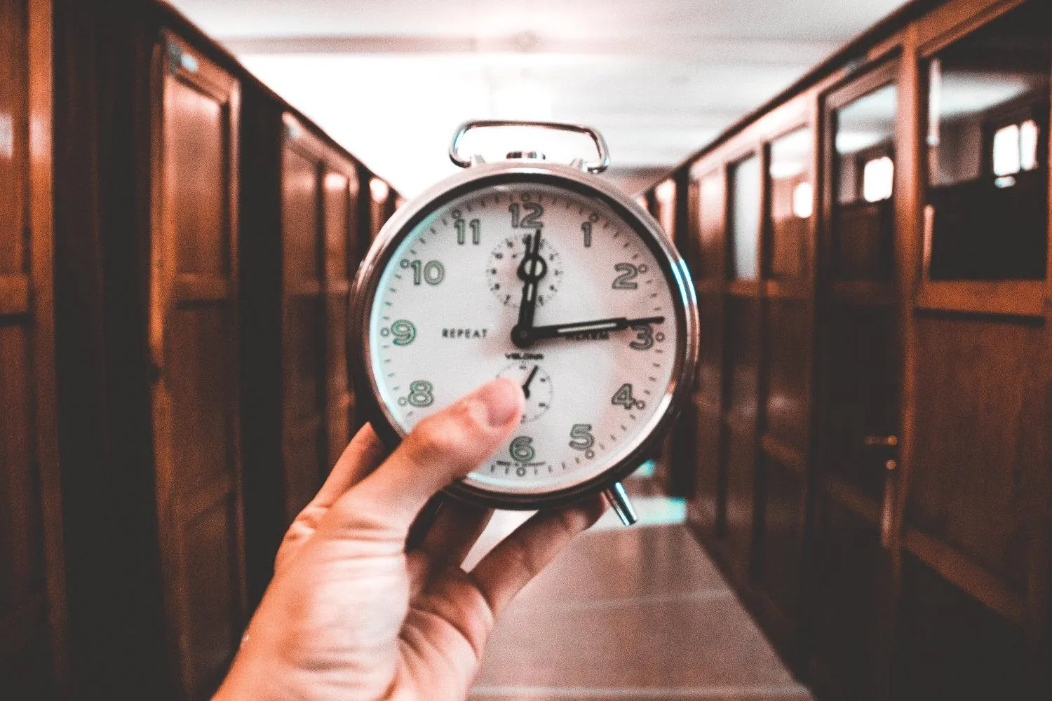 Clock and planner representing balanced time management